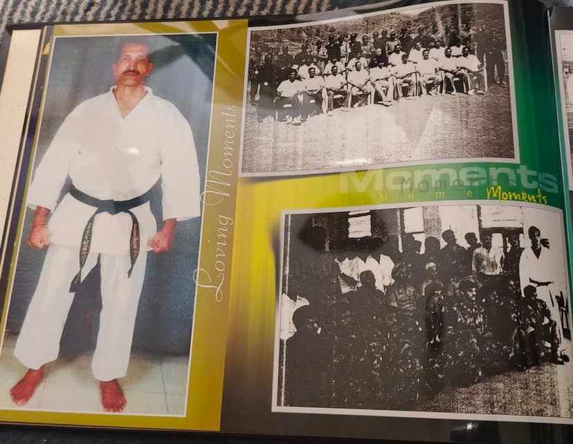 Large solo portrait of black-belt instructor