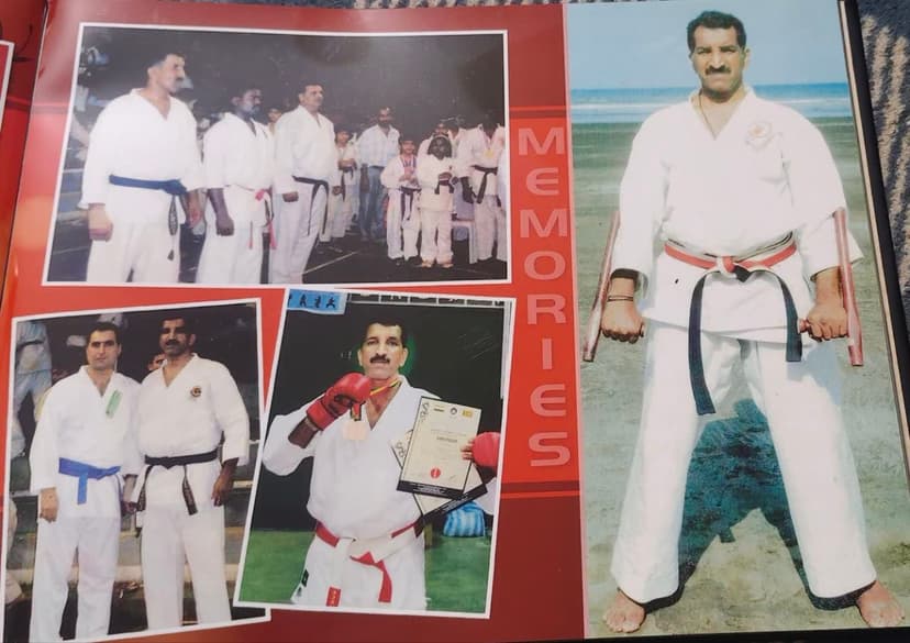 Group photo and instructor portrait, kobudo bo staff pose on beach